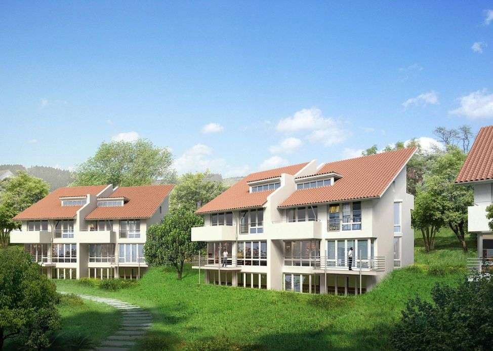 Architectural rendering of modern multi-family homes with red-tiled roofs, large windows, and balconies, surrounded by greenery and landscaped paths. | ZoDen Engineers